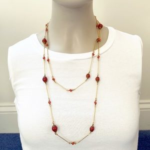 Long chic gold segment & burgundy bead necklace